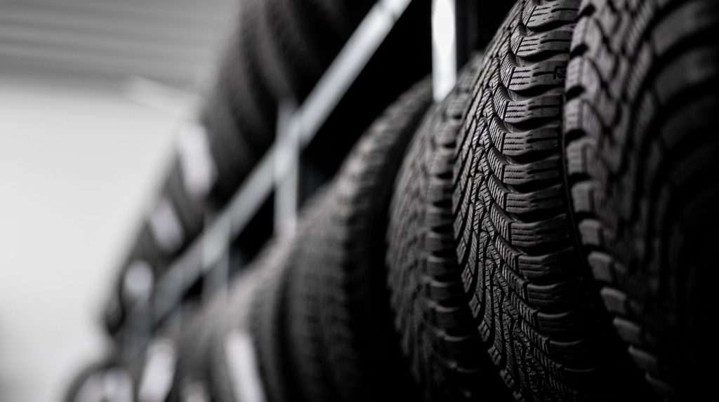 A row of tires in a manufacturing facility.