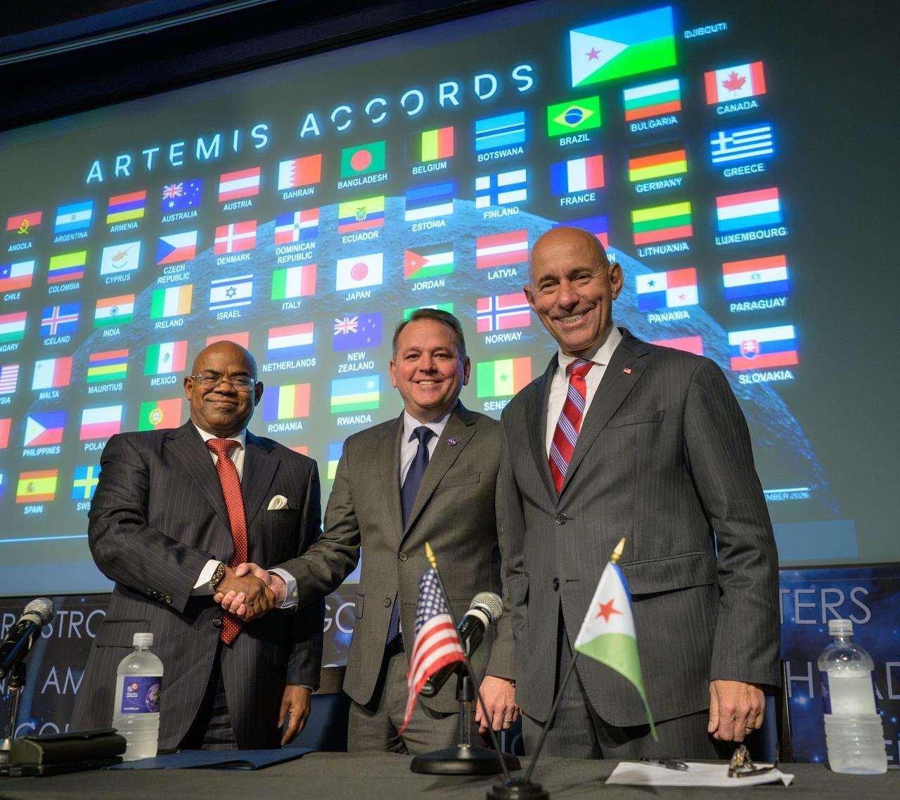 NASA Deputy Administrator Matt Anderson, center, Ambassador of Djibouti to the United States, Mohamed Siad Douale, left, and Assistant Secretary of State for African Affairs, Frank Garcia, right, pose for a group photograph after the Artemis Accord signing, Monday, September 14, 2026, at the Mary W. Jackson NASA Headquarters building in Washington. Djibouti is the 72nd country to sign the Artemis Accords, which establish a practical set of principles to guide space exploration cooperation among nations participating in NASA’s Artemis program.