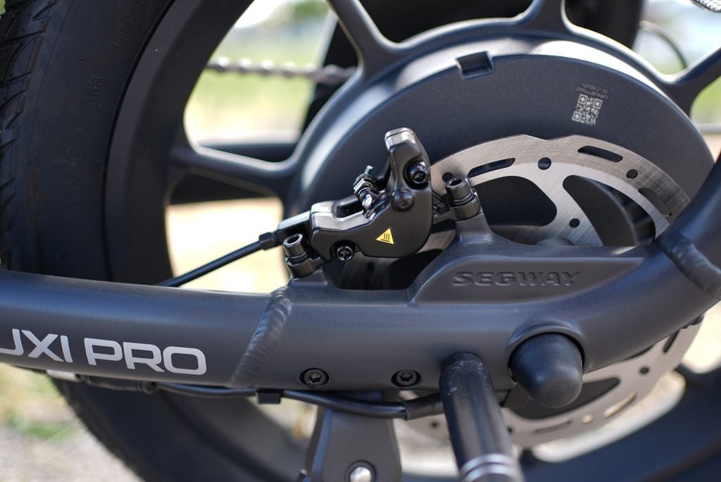 Segway MUXI PRO Review: The Auto Shifter Changes Everything 4 Segway MUXI PRO rear hydraulic disc brake with 180mm rotor