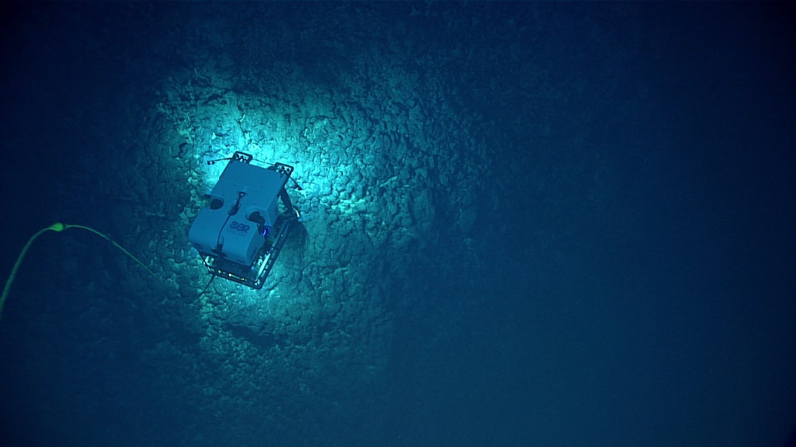 a remotely operated machine images a sea floor