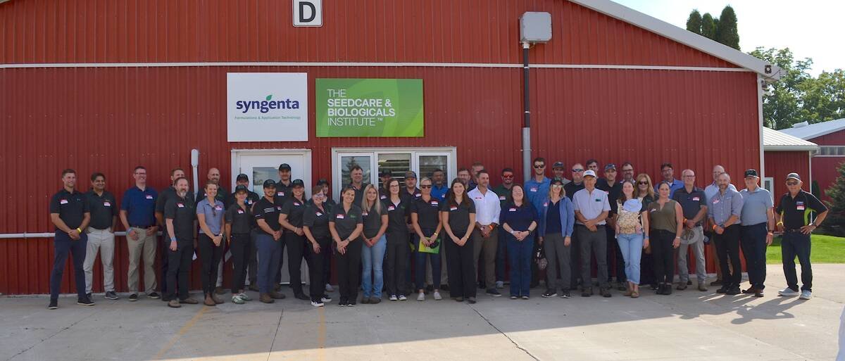 A group of Syngenta staff and visitors gather to celebrate the unveiling of the updated Canadian Seedcare and Biologicals Institute facility in Plattsville, Ont. on Sept. 16, 2026. Photo: Zak McLachlan