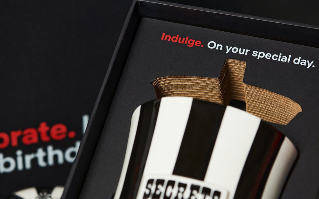 Eco-friendly modular Netflix gifting box with layered paperboard design