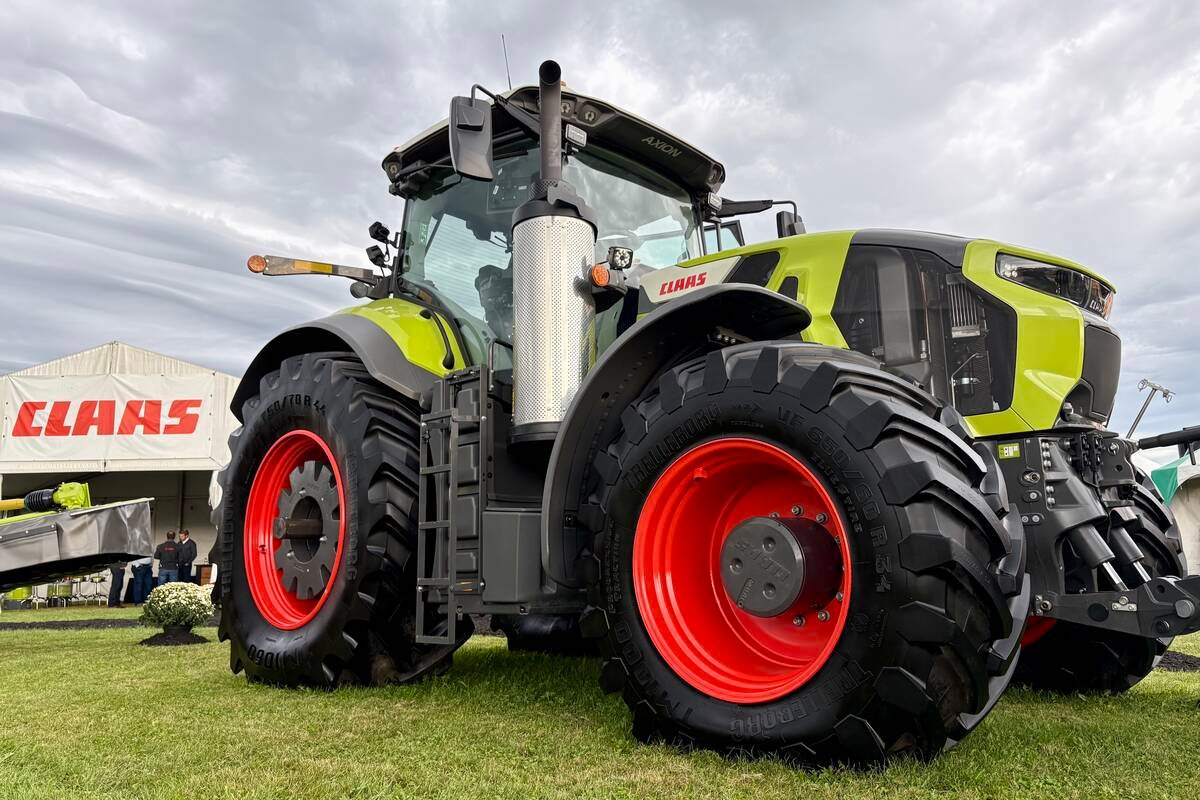 A Claas Axion 8 tractor on display at Canada's Outdoor Farm Show.