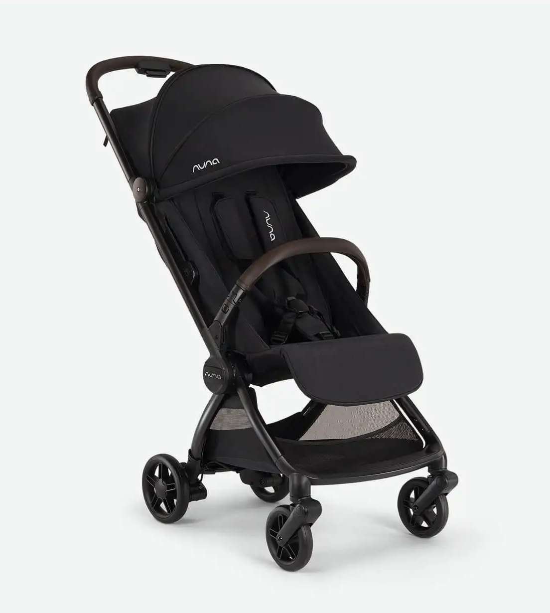 A black Nuna baby stroller with four wheels, a canopy, padded seat, and safety harness, shown at a three-quarter angle on a white background.