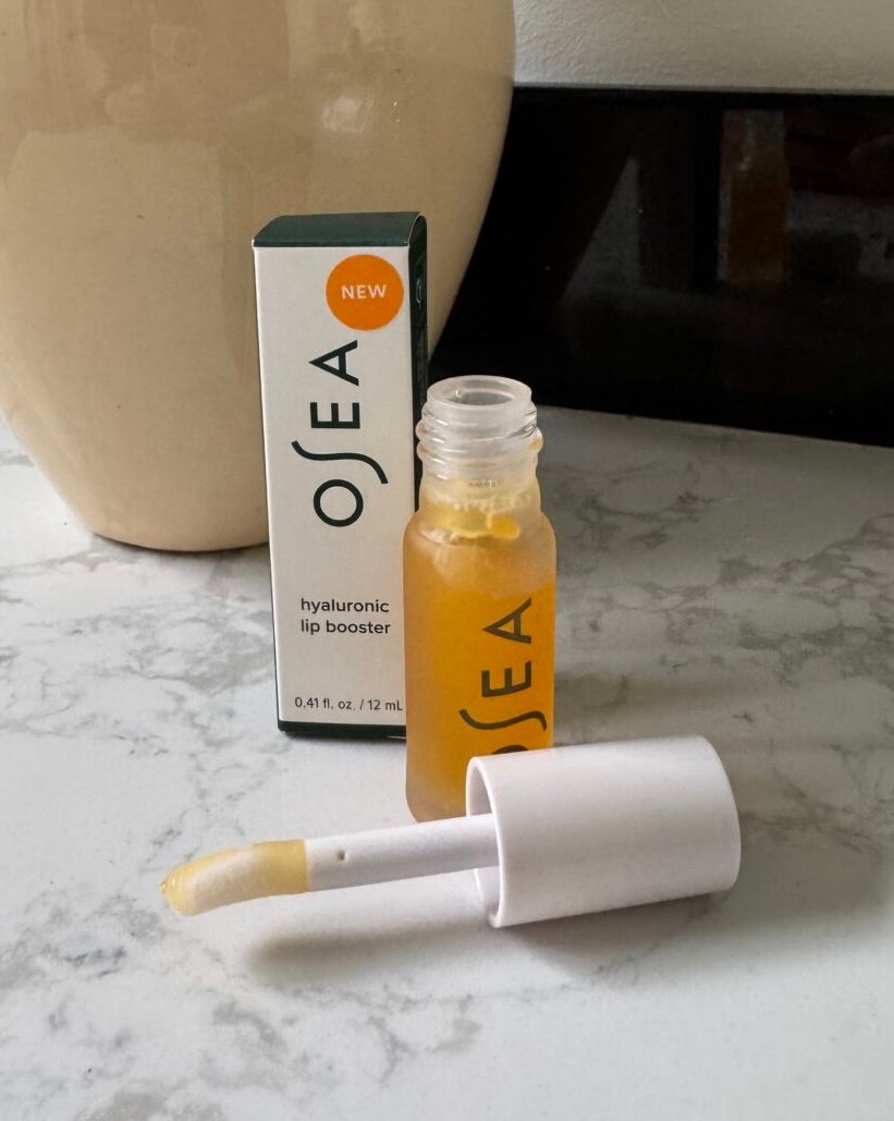 OSEA Hyaluronic Lip Booster box and open bottle with applicator wand.