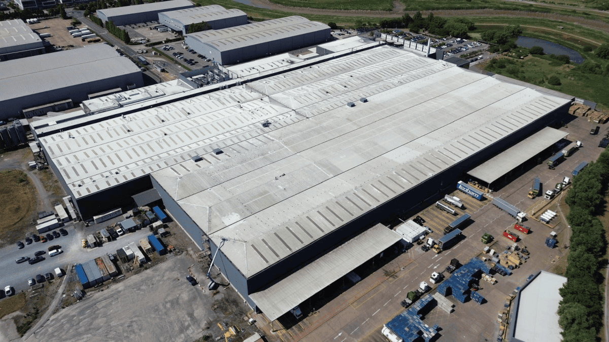 Aerial view of Refresco's Bridgwater manufacturing facility, showing the extensive roof area before installation of solar panels.