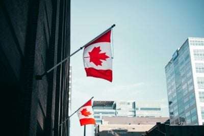 canada flag neu unsplash tom carnegie Canada flag unsplash tom carnegie